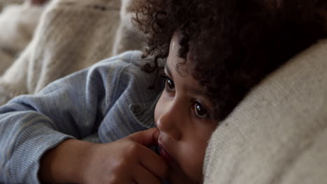 boy watching television at home shot on r3d