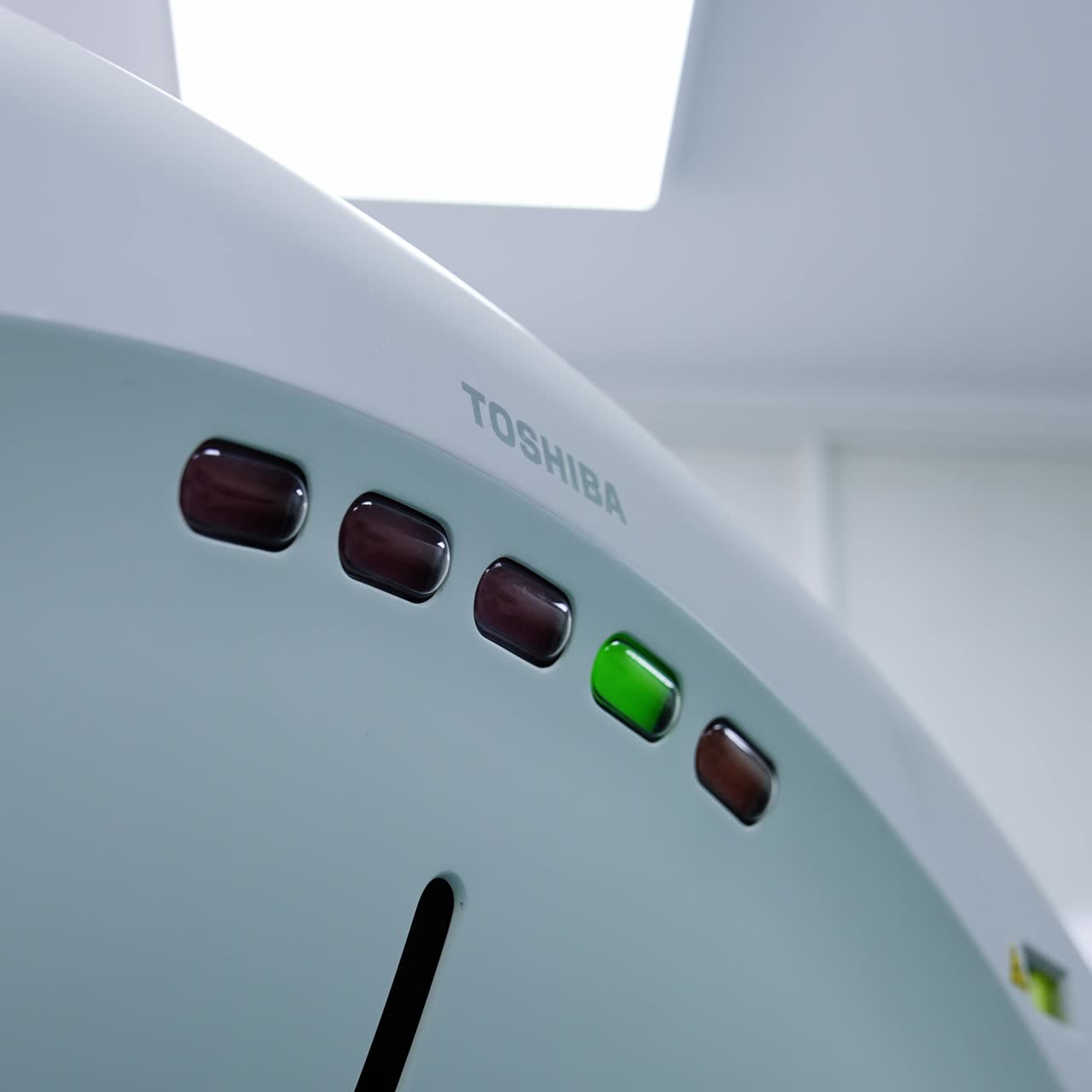 Top part on the magnetic resonance machine Toshiba. Five long lamps on the equipment for tomography