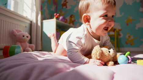 baby playing on playmat