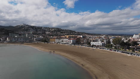 aerial over playa sur beach and sea curve in peniscola, spain with soft daylight