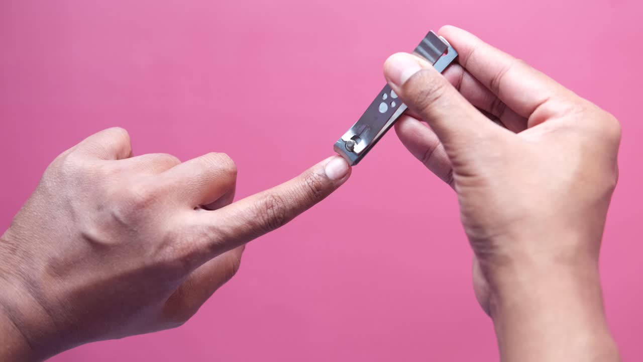 Person using nail clippers