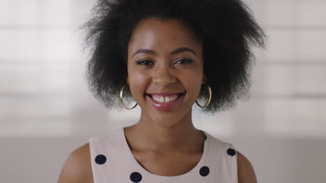 close-up-portrait-of-beautiful-young-african-american-business-woman-smiling-happy-successful-black-female-afro-hairstyle