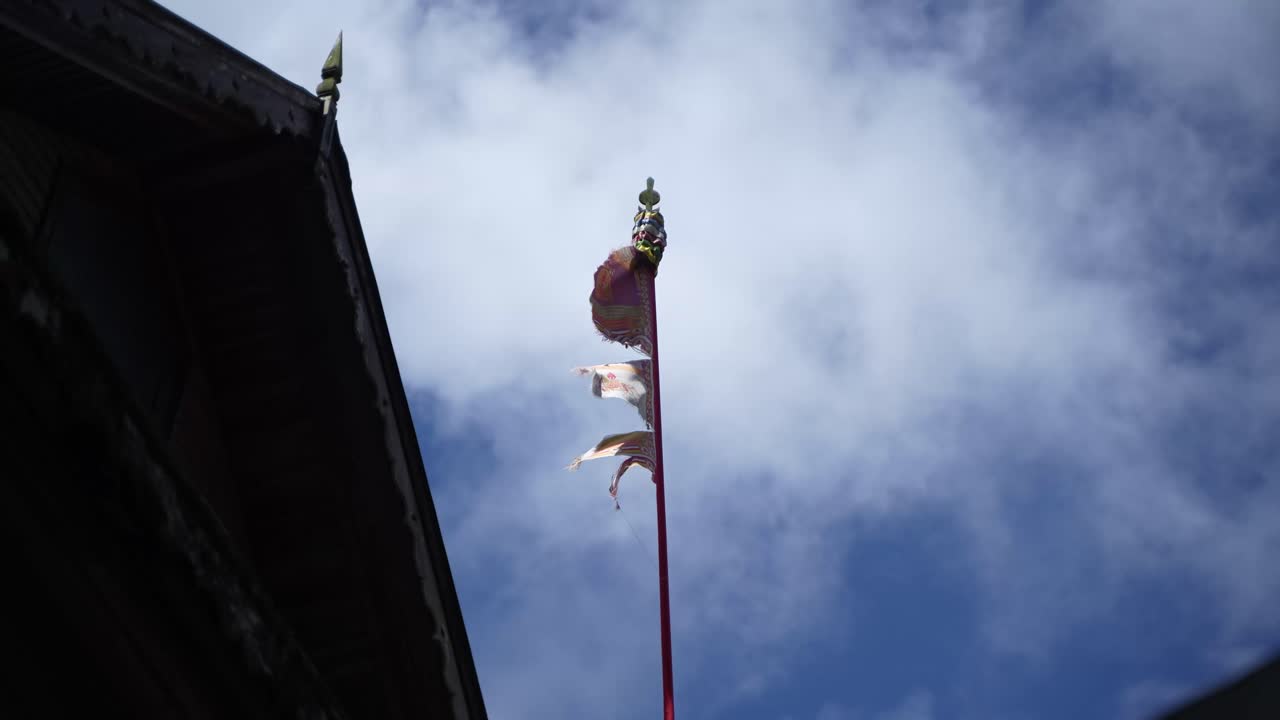 This kind of flag is hoisted near the Buddhist religion house