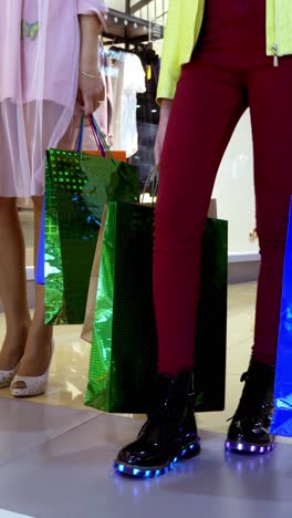 women shopping in a mall