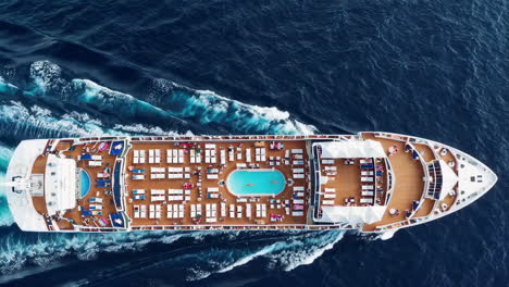 aerial view of a cruise ship with passengers on deck and pool