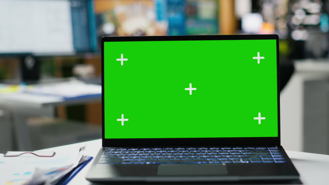 Green screen and CAD display on dual monitors at the architecture workstation