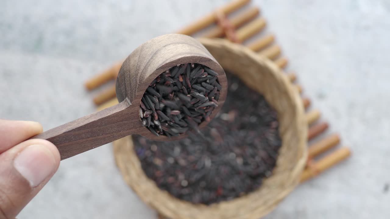 Black Rice in Wooden Spoon