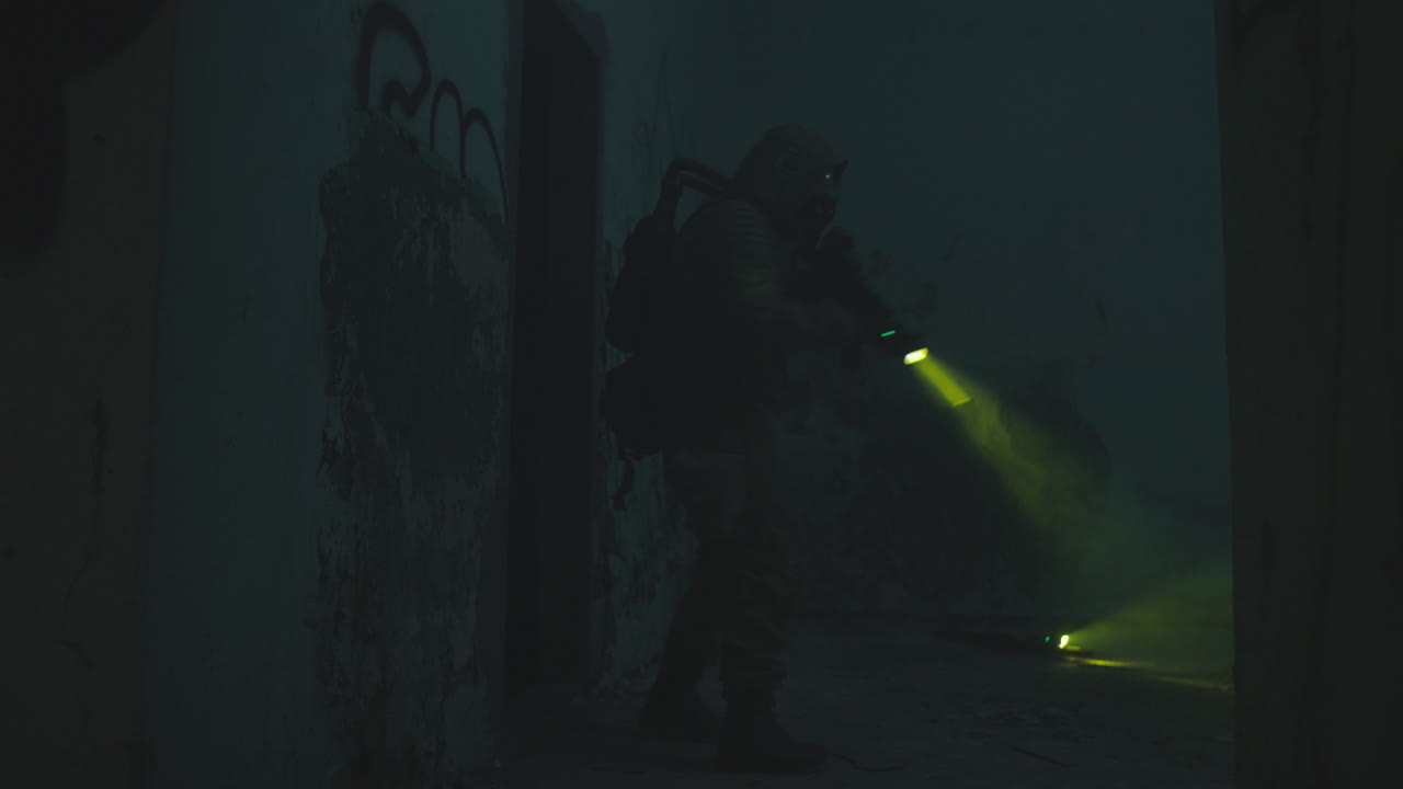 A wounded soldier in the abandoned military complex during the recon mission