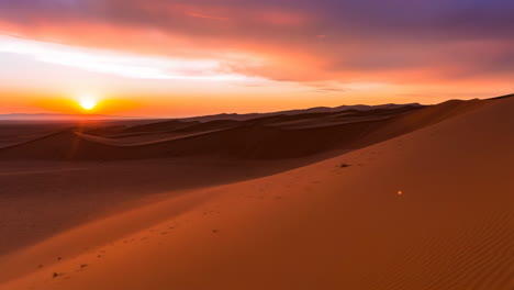 golden sunset over desert dunes