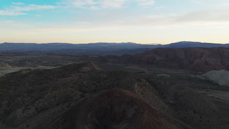aerial view of santa clara volcano in the diamond valley in washington county, utah, usa. - pullback shot