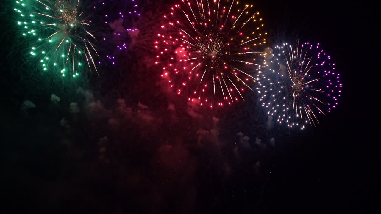 Beautiful colourful fire work display at night for celebration in festival