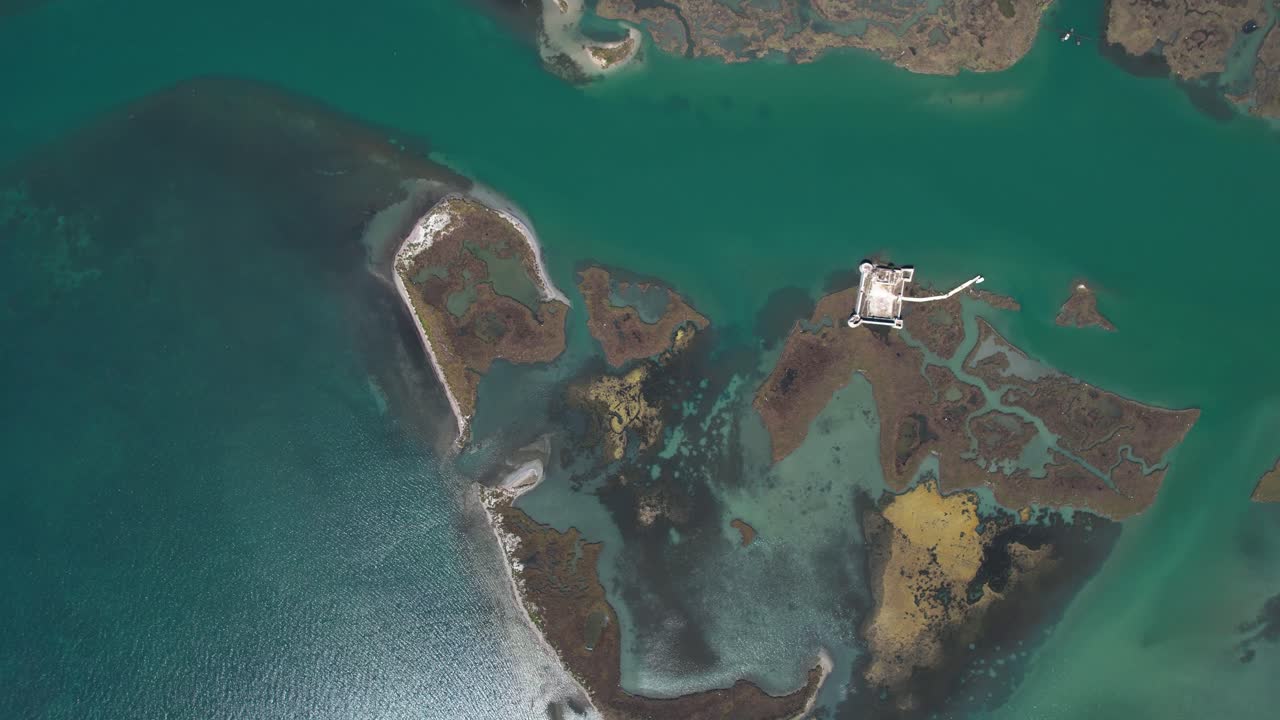 Lagoon's Hidden Jewel: Aerial View Unveils an Ancient Castle on the Water, a Gem Nestled Near Butrint's Archaeological Site