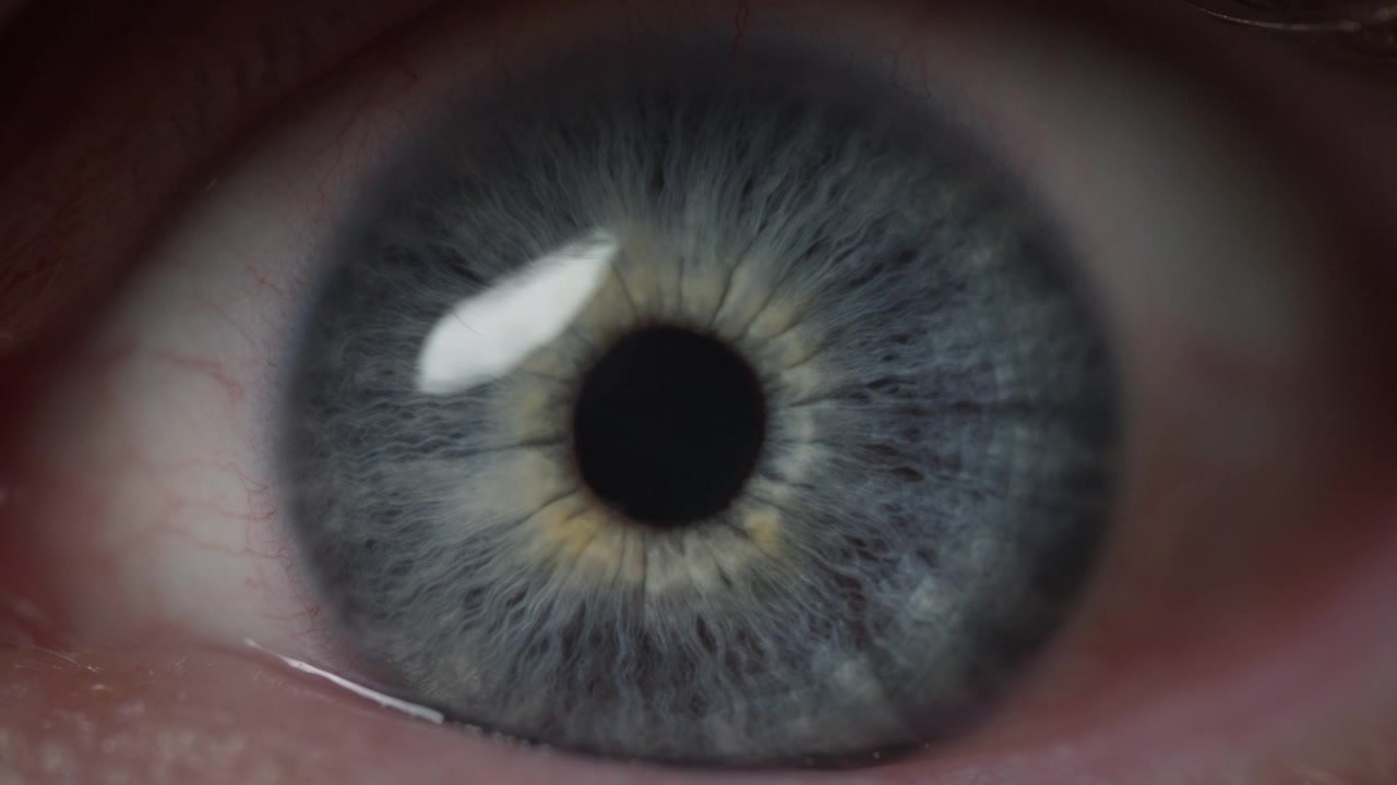 Blue eye opening wide
