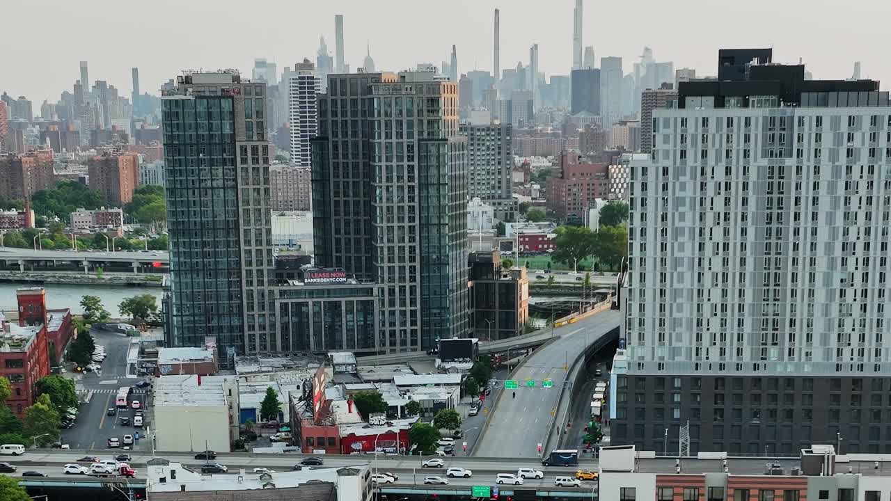 Aerial view of busy New York City streets and skyline during sunset