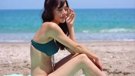 pretty sexy young woman sunbathing