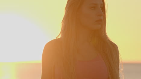 Woman-at-sunrise-by-the-sea