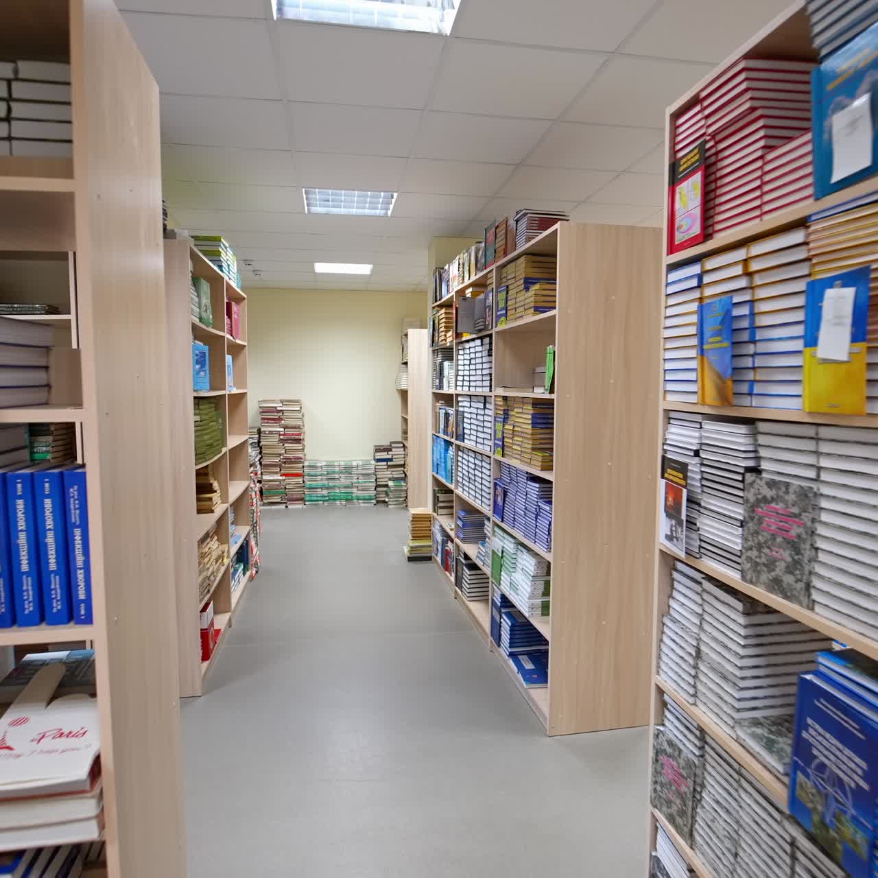 Bookshelves in university library. Interior of the library with shelves full of books