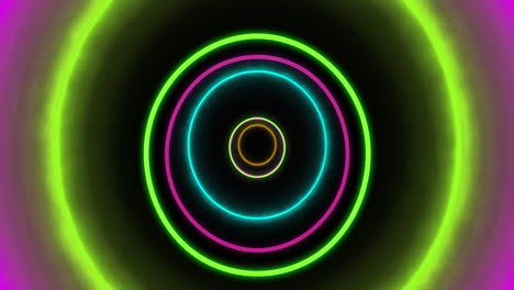 animación de círculos de neón que se mueven sobre un fondo negro.