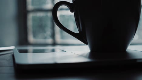 rainy day workspace with coffee