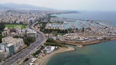 Athens,-Greece-coastline-beach-Aegean-sea-aerial-Marina-port-in-Piraeus