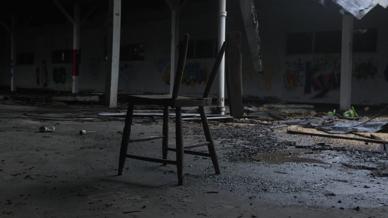 broken wooden chair in creepy abandoned building atlanta