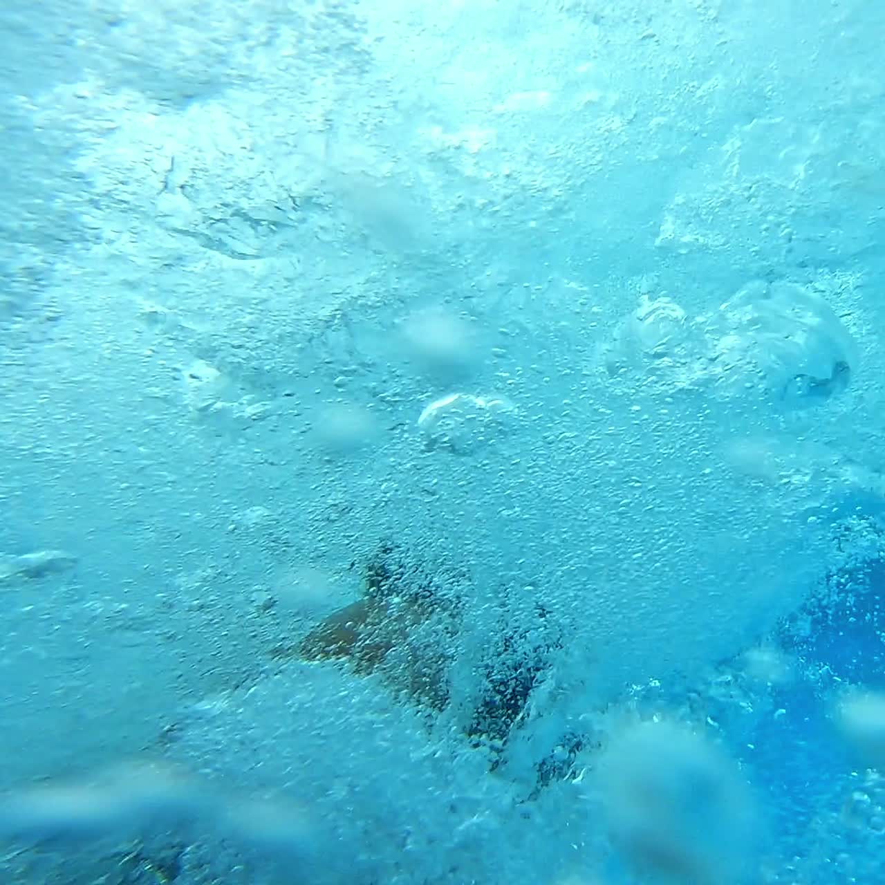 Man having fun in a water park. Slow motion