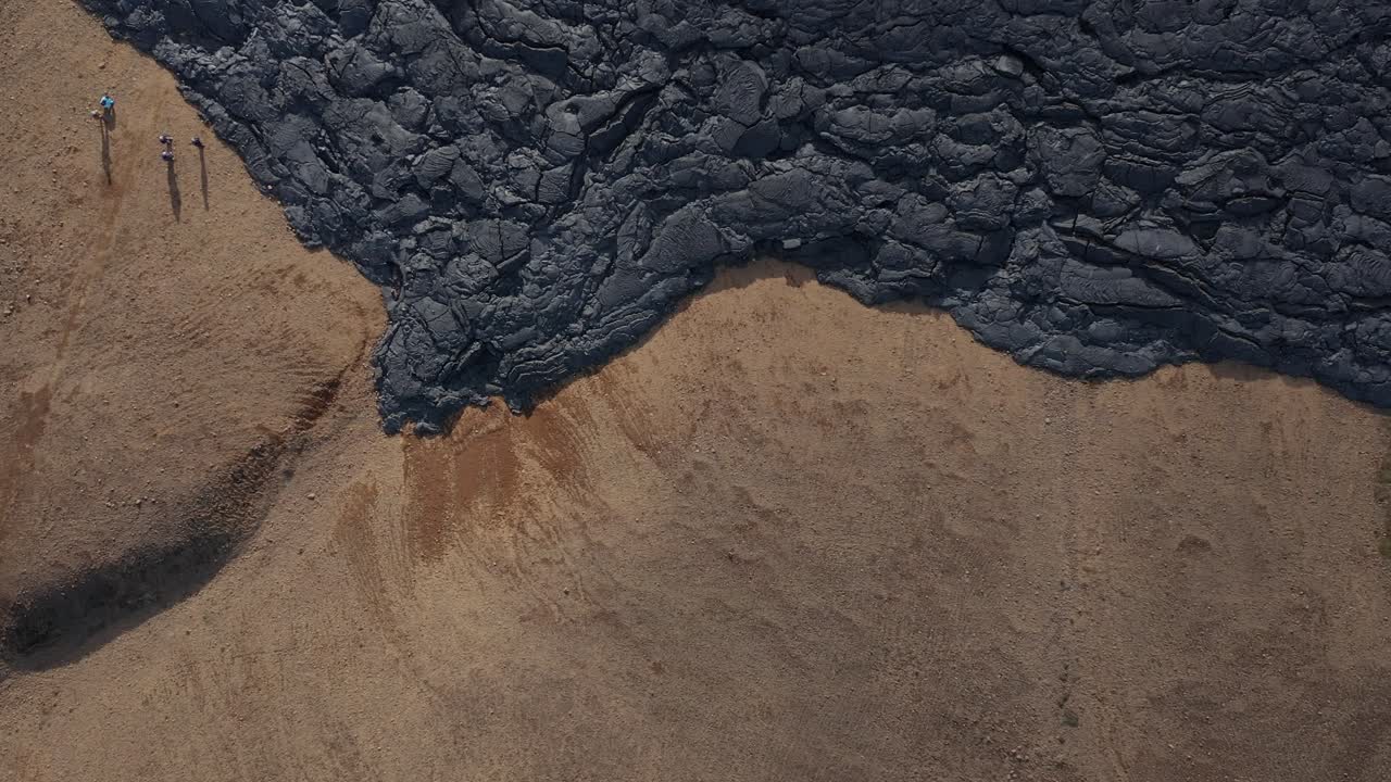 Black solidified lava field in Natthagi valley of Iceland, top down