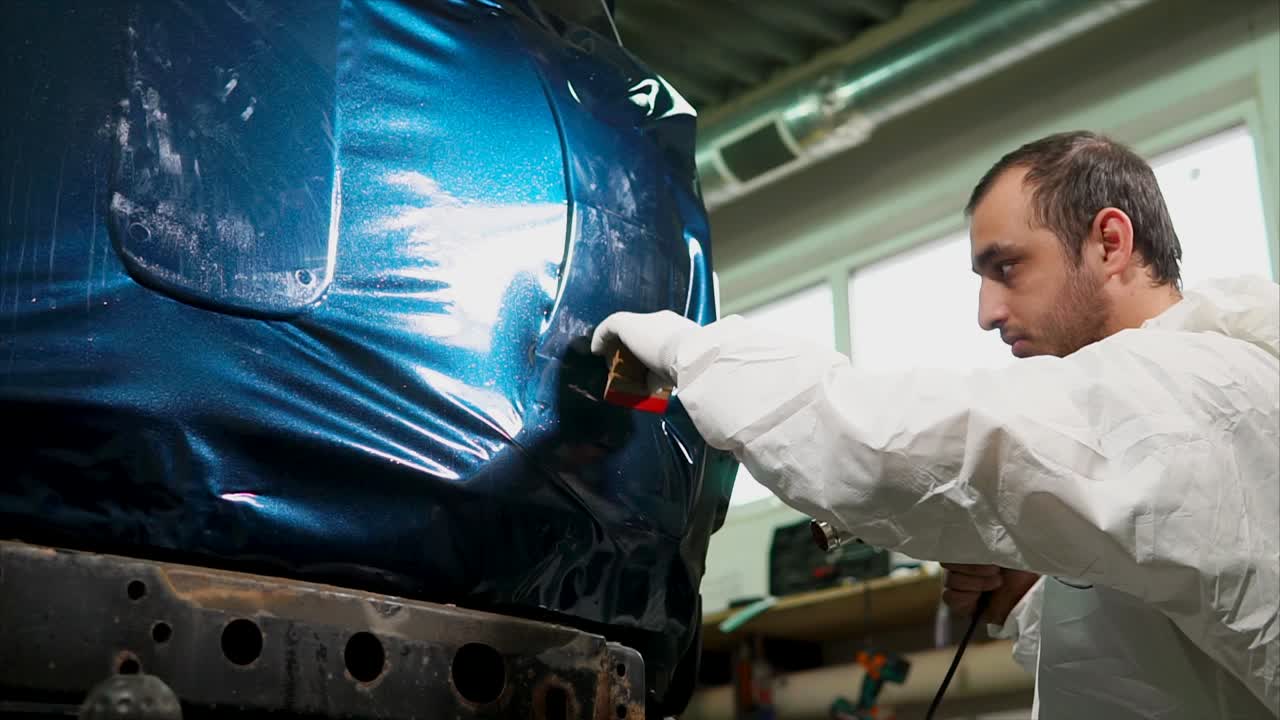 Car Wrap Installation in a Repair Shop