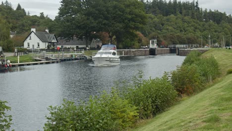 boat travelling through locks toward loch ness