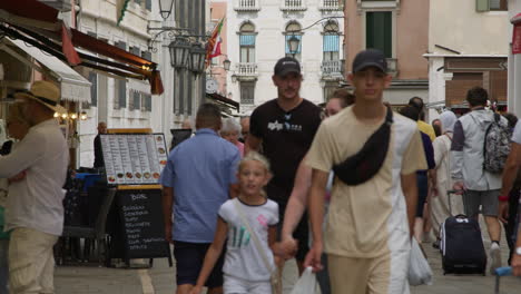 crowded street scene in venice, italy