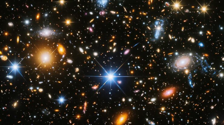 Un fotogramma video ipnotico di una vista dello spazio profondo, che mostra innumerevoli galassie e stelle