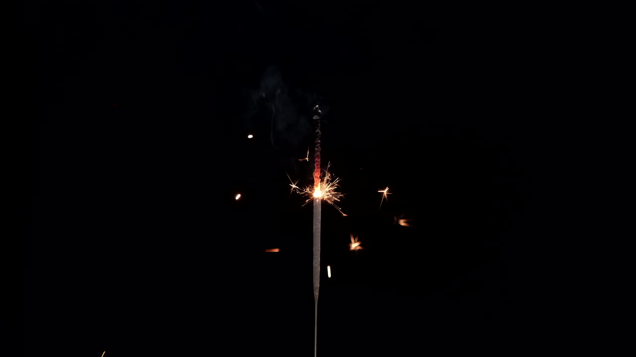 Sparklers fireworks burning on black background for New Year's Eve celebration, Christmas, special event, holiday