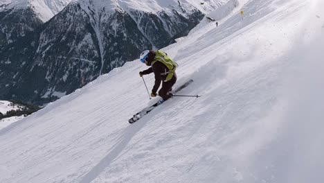 amazing ski show of a young professional skier in a ski resort in the austrian alps