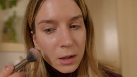 Girl-doing-makeup-on-herself-at-home