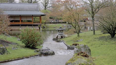 traditional ceremony tea house in the japanese garden - wide angle