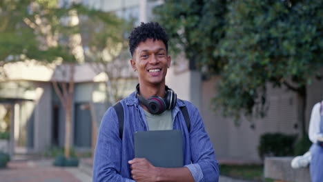 portrait of a smiling student on campus
