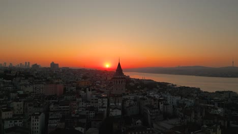 4k cinematic drone footage featuring istanbul’s iconic galata tower rising above the historic beyoğlu district at golden hour. istanbul -turkey_03