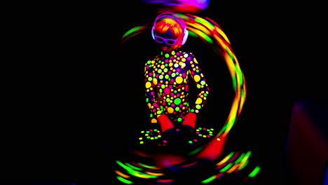 disco female glow dj covered in flurorescent spots