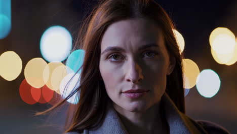 woman's candid portrait at night with bokeh background