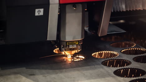 CNC-Laser-cutting-of-metal,-modern-industrial-technology.