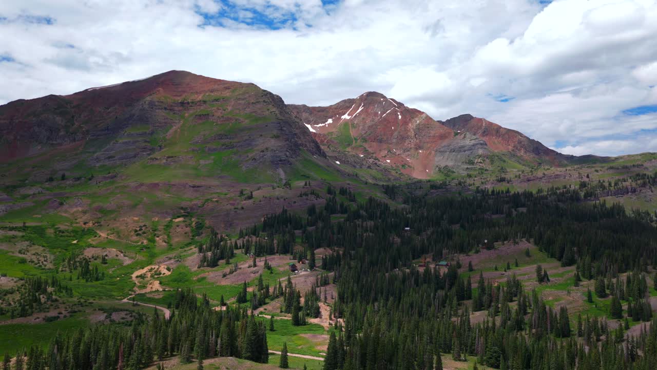 Kebler Pass Lake Irwin Trail camping campsite tent 4wd road spring summer aerial drone Crested Butte Colorado Gunnison National Forest Robinson Basin Ruby Peak morning blue sky clouds zoom in