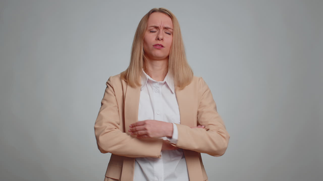 Dissatisfied business woman asking reason of failure expressing disbelief irritation feeling bored