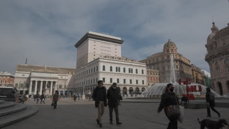 genova piazza de ferrari square with fountain, carlo felice theater and garibaldi statue. urban cityscape street.