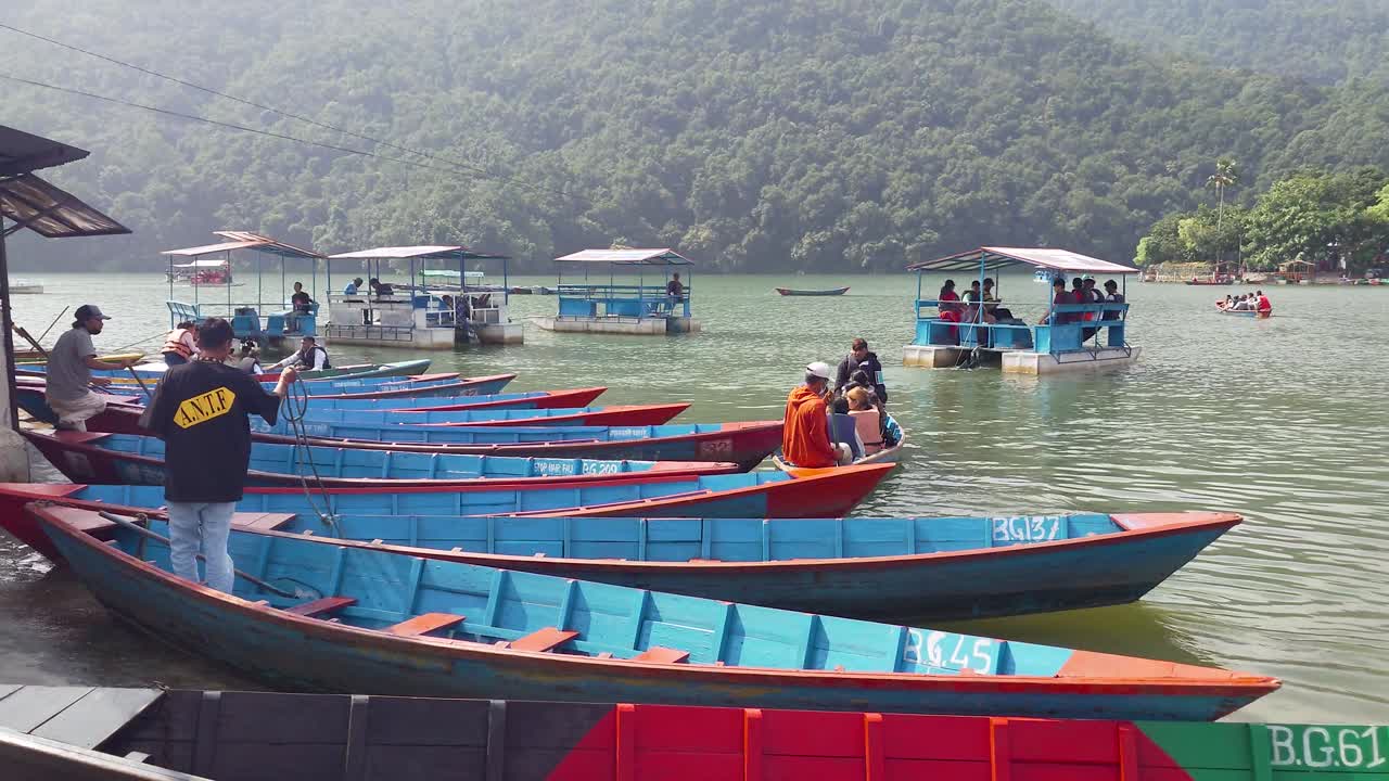Beautiful Lake Scenery with Boats and People