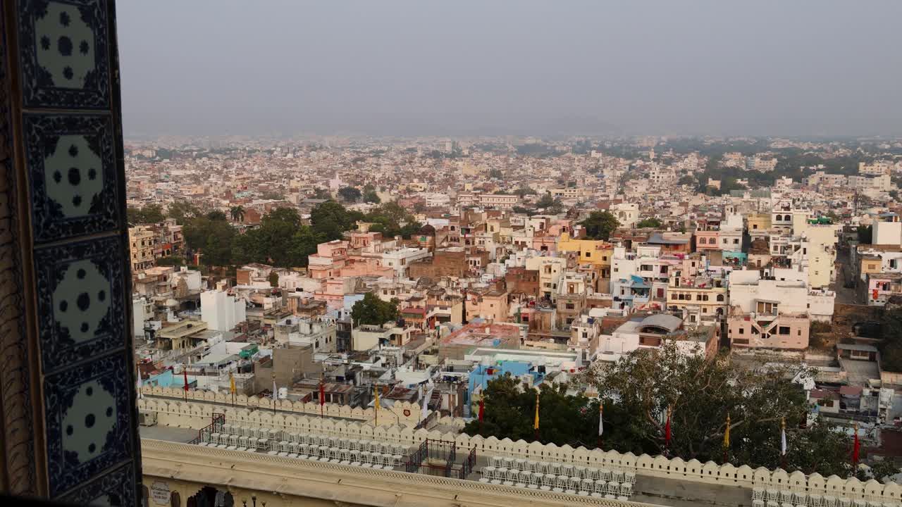 city view with artistic palace at lake shore at day video is taken at city palace, Udaipur rajasthan india.