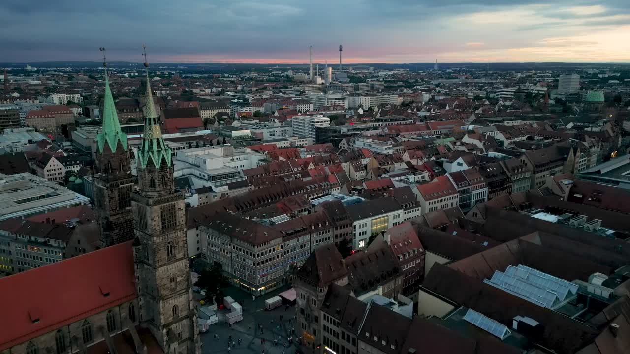 4K Aerial Drone Video of the Historic Buildings of Downtown Nurnberg, Germany featuring Nuremberg State Theater and St. Lorenz Church