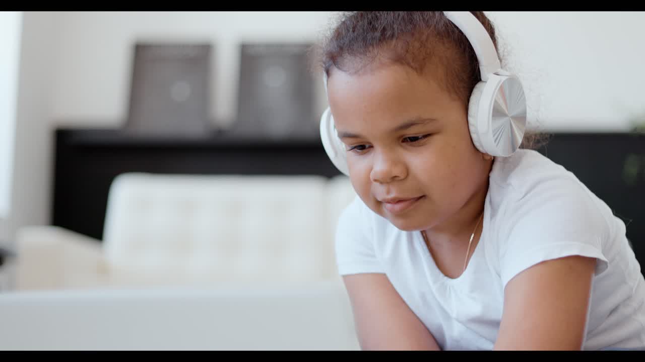 Girl Learning Online with Headphones