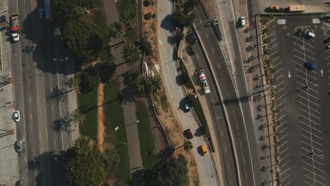 Afternoon-drone-view-from-a-pedestrian-park-near-the-Pacific-Coast-Highway,-Santa-Monica-Beach,-California