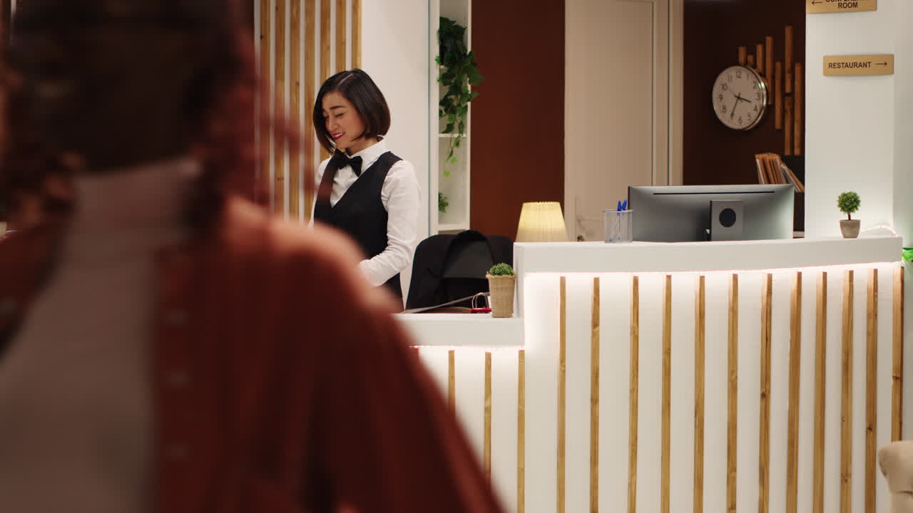 Guests checking out from hotel