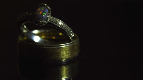 wedding rings, engagement on top on man's wedding ring with light motion 4k